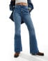 Фото #1 товара Wrangler fierce flared jeans in mid blue