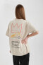 Unisex Jean Michel Basquiat Oversize Fit Bisiklet Yaka Sırt Baskılı Kısa Kollu Tişört C3567ax24sm