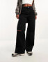 ASOS DESIGN wide leg dad jeans with rips in washed black