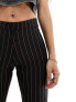 ONLY Petite flared trousers in black pinstripe