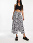 ASOS DESIGN button through midi skirt with split in mono daisy print