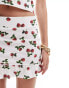 Фото #3 товара ASOS DESIGN frill hem mini skirt co-ord in strawberry print