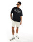 ASOS DESIGN t-shirt in black with Sport Club chest print