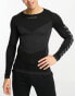 Фото #7 товара Hummel First seamless jersey long sleeve t-shirt in black