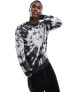 Фото #1 товара ASOS DESIGN relaxed knitted jumper in black with tie dye pattern