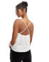 Фото #2 товара ASOS DESIGN textured strappy cami peplum top in white