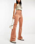 Free People cord high-waisted flares in tan