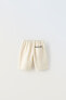 Textured plush bermuda shorts