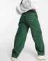 ASOS DESIGN Curve mid rise oversized 'skater' jean in racing green with contrast white thread