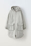 Long technical parka with pockets