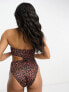 Фото #2 товара ASOS DESIGN bandeau cut out swimsuit in tortoise shell print
