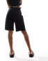 ASOS DESIGN longline shorts with leopard waistband in black