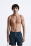 Check-texture weave swimming trunks