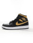 Air Jordan 1 mid trainers in black and gold