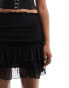 Monki mini ruffle skirt in black