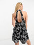 ASOS DESIGN linen look halter a line playsuit in sketchy floral