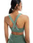 Фото #8 товара Puma Training Evolve medium support sports bra in light green