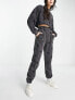 Фото #1 товара ASOS DESIGN co-ord jogger with floral embroidery in washed black