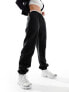 The Couture Club teddy fleece joggers in black