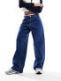 Фото #1 товара Tommy Jeans Daisy low waist baggy jeans in dark wash