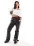 Фото #1 товара Vero Moda Curve leather look flared trousers in black