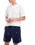 Фото #1 товара Polo Ralph Lauren Prepsters all over retro sports logo print flat front twill chino shorts in navy