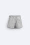 Check-texture swimming trunks