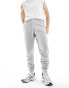 Фото #1 товара The North Face Training Reaxion fleece joggers in grey