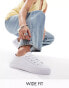 Фото #2 товара ASOS DESIGN Wide Fit Dizzy lace up trainers in white