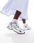 New Balance 530 trainers in white and purple