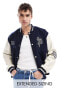 ASOS DESIGN oversized varsity jacket with faux leather sleeves in navy Синий, S - Chest 38 - фото #1