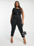 ASOS DESIGN Curve – Jumpsuit aus Scuba-Stoff in Schwarz mit Schleife, One-Shoulder-Träger und Gürtel