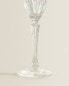 Engraved crystalline flute glass