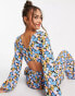 Фото #3 товара ASOS DESIGN bubble crepe button back long sleeve jumpsuit in blue floral