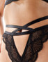 Фото #2 товара ASOS DESIGN Roma lace cut out strappy thong in black