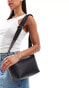 Calvin Klein Jeans over webbing shoulder in black