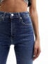 Фото #7 товара Calvin Klein Jeans high rise skinny jeans in mid wash