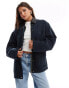 ASOS DESIGN oversized washed jacket with leather look collar in navy