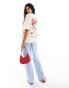 ASOS DESIGN oversized tee with amsterdam flower graphic in ecru