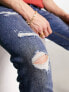 Jack & Jones Intelligence – Glenn – Schmal geschnittene Jeans in verwaschenem Mittelblau mit Abnutzungen
