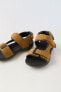 Technical leather sandals