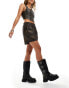 Noisy May faux leather shorts in washed brown