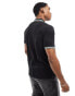 Calvin Klein – Poloshirt aus Stretch-Pikee in Schwarz mit Zierstreifen