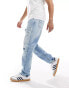 Tommy Jeans – Isaac – Schmal zulaufende Jeans in heller Waschung mit Abnutzungsdetails Голубой, W34 L32 - фото #3