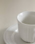 Porcelain coffee cup and saucer