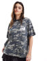 Фото #4 товара ASOS DESIGN oversized t-shirt with graphic in washed camo print