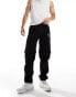 Фото #1 товара The North Face Exploration Convertible cargo pocket tapered trousers in black