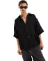 Фото #1 товара Weekday oversized short sleeve shirt in black