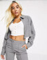 COLLUSION flared trousers with waist strap detail in grey co ord