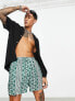 Фото #1 товара ASOS DESIGN swim shorts in short length with aztec print